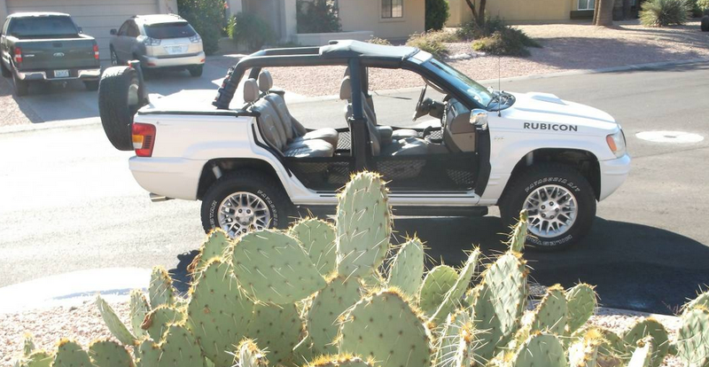 Illustration for article titled This Wrangler-ized Jeep Grand Cherokee Is Going To Haunt My Nightmares